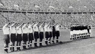 England perform a Nazi salute before a game in Berlin. 100,000 fans turned up for the match. 1938